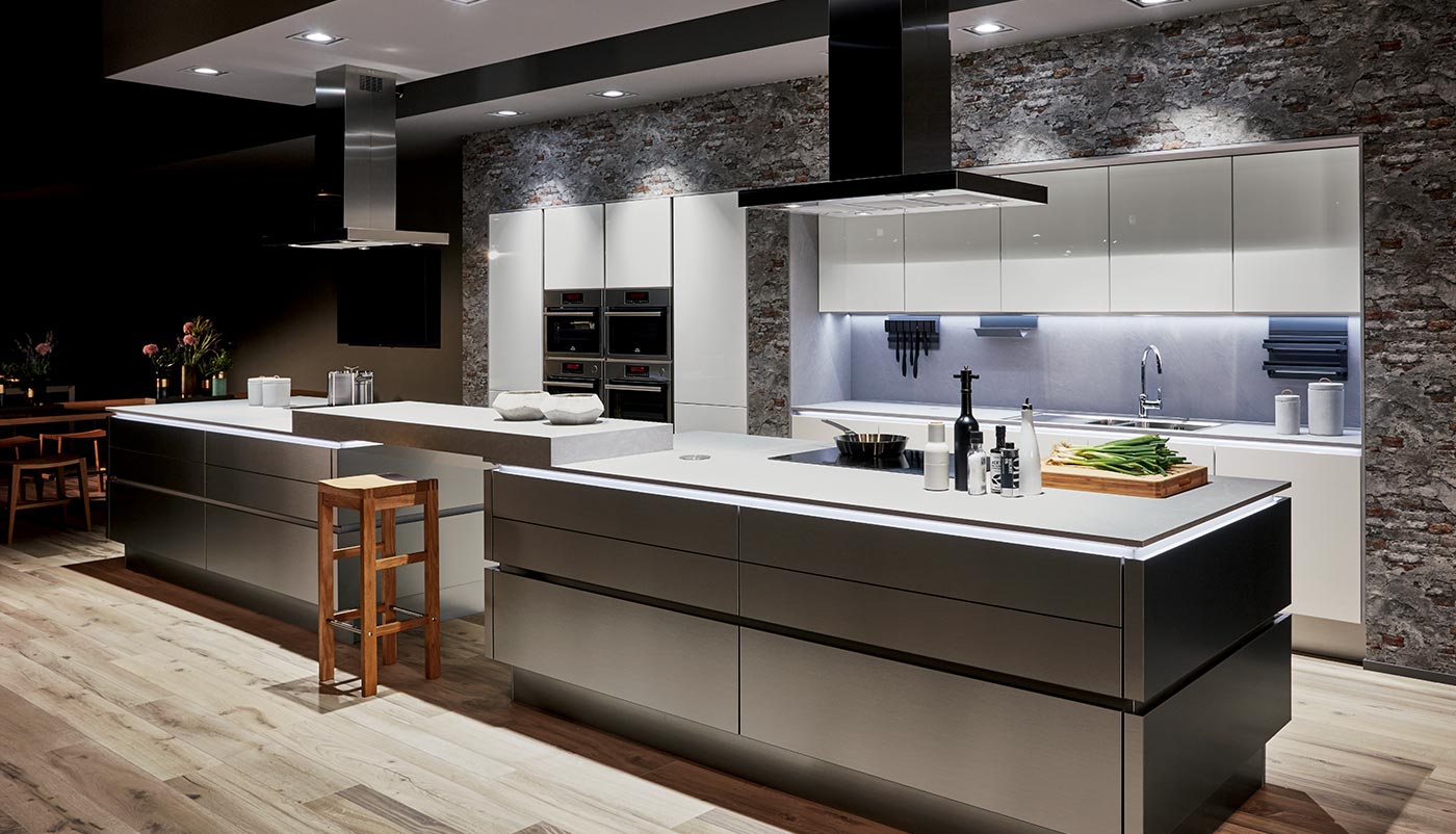 What are the advantages of using a kitchen designer to create your kitchen?